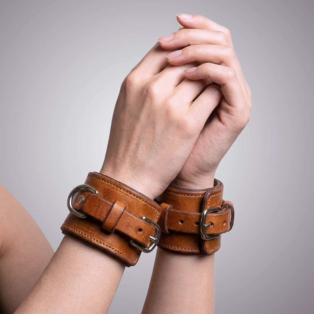 Lt Brown Leather wrist and ankle cuffs set with attachment clips. 
