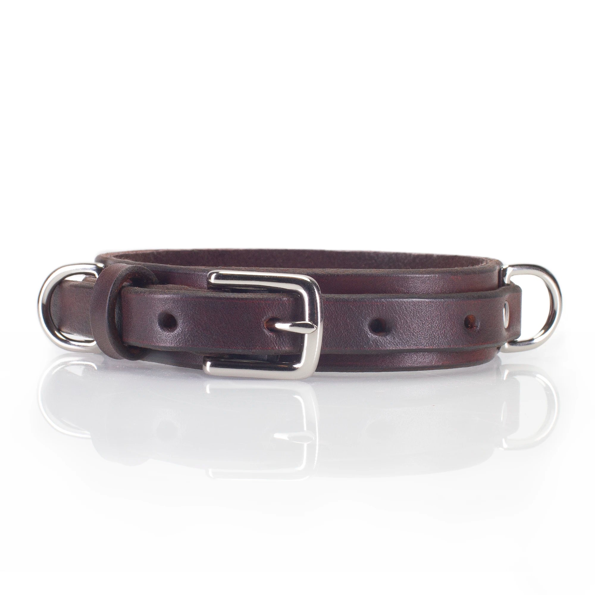 low-profile bondage collar in mahogany leather with polished nickel hardware and suede lining.